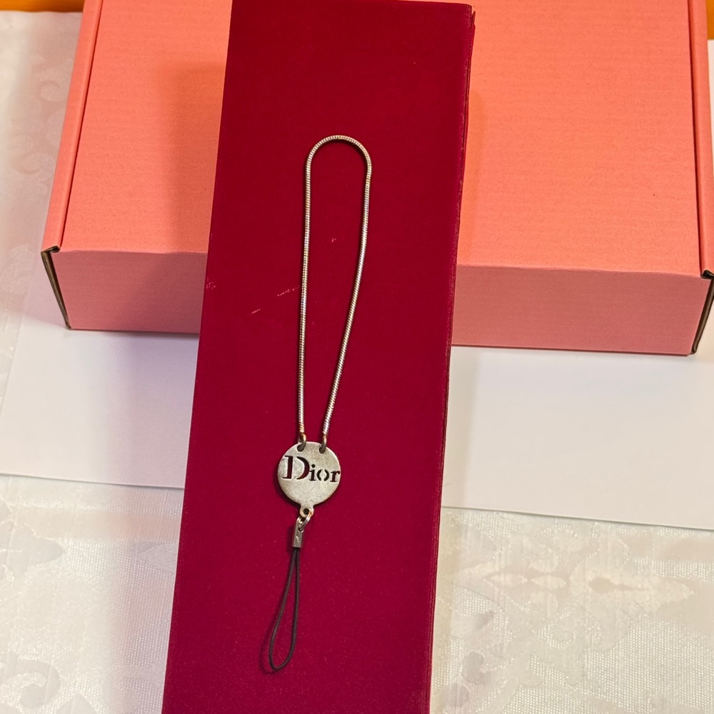 Dior Silver Case phone holder 
In decent condition Silver Dior Logo - Picture 3 of 12